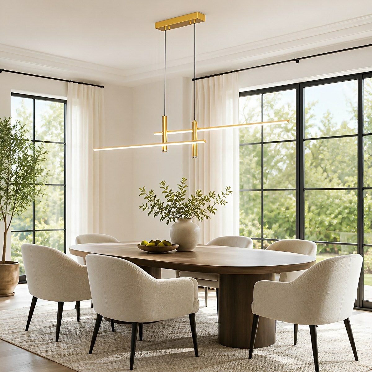 Modern linear LED pendant light above a dining table