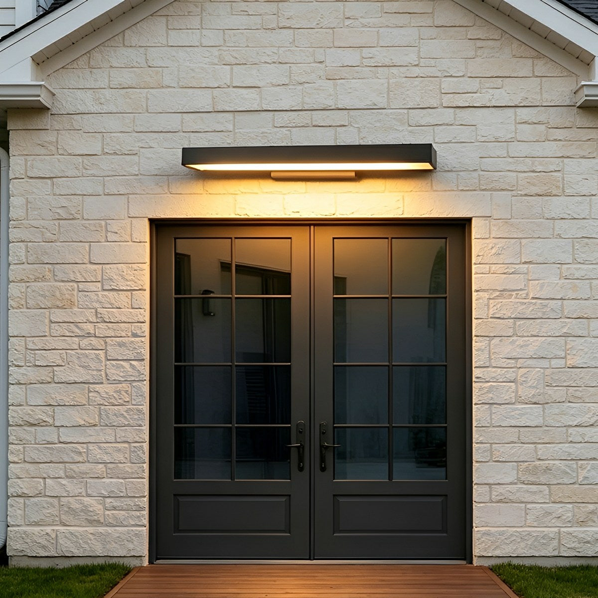 Modern linear outdoor wall light on a contemporary facade