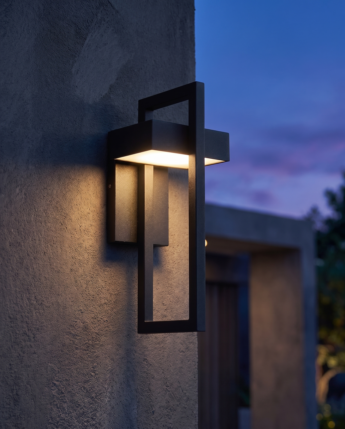 Modern luxury outdoor wall lamp, close-up dusk exterior detail