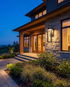 Modern luxury outdoor wall lamp, wide dusk entryway shot