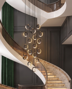 The Lumen Bar Pendant Chandelier, wide bedside table shot